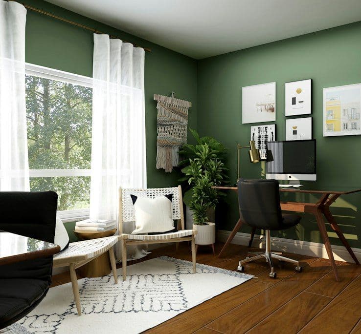 Green feature wall with leather sofa
