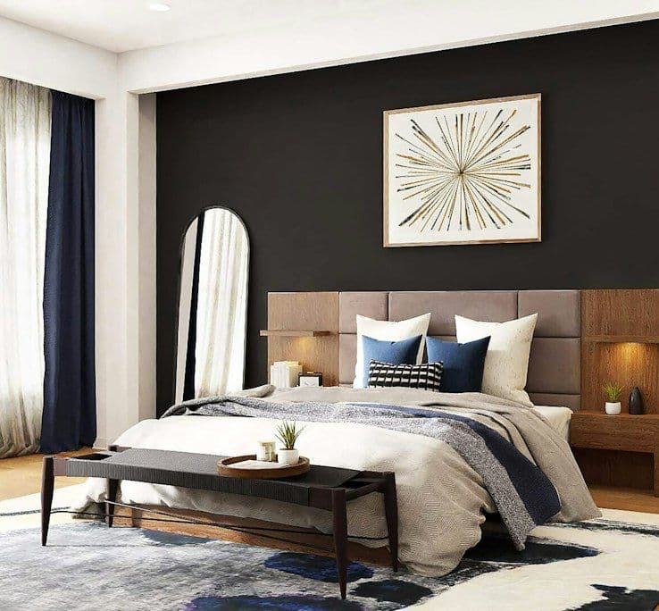 Bedroom with dark feature wall and bench