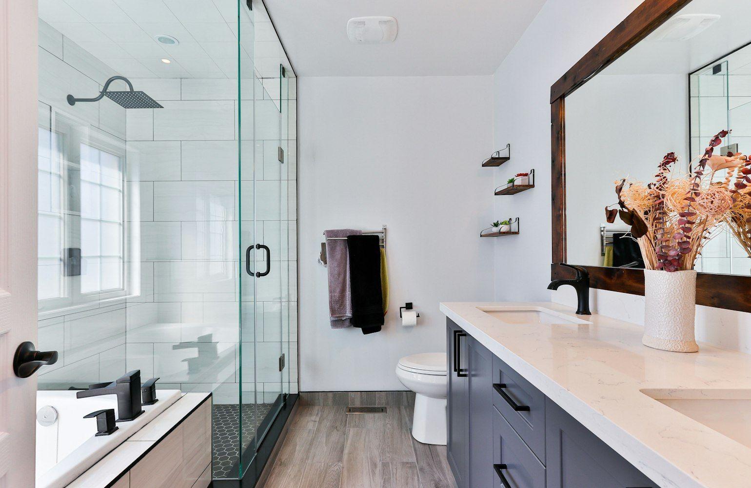 Modern bathroom with walk-in shower and floating vanity