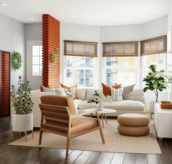 Living room with warm lamps and orange accent chairs